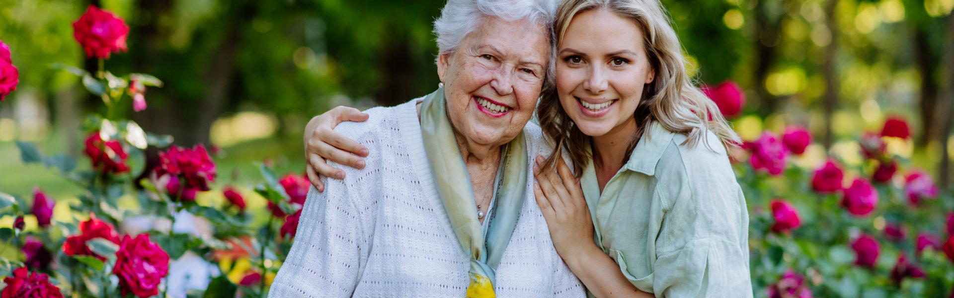 caregiver hugging elder