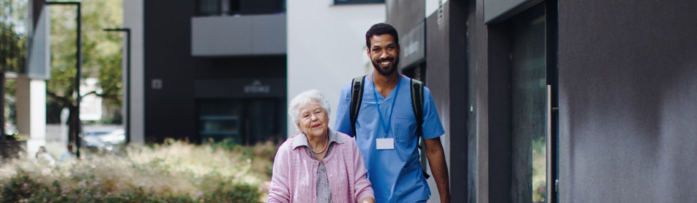 caregiver checking elder's sugar level
