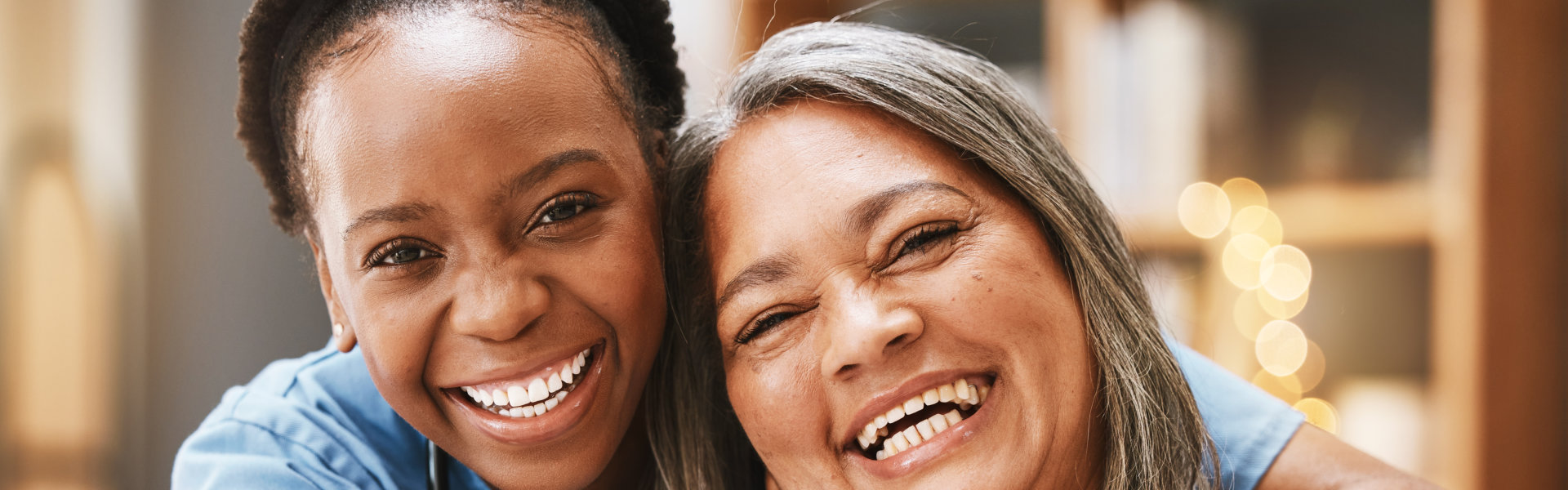 nurse and elder showing their lovely smiles
